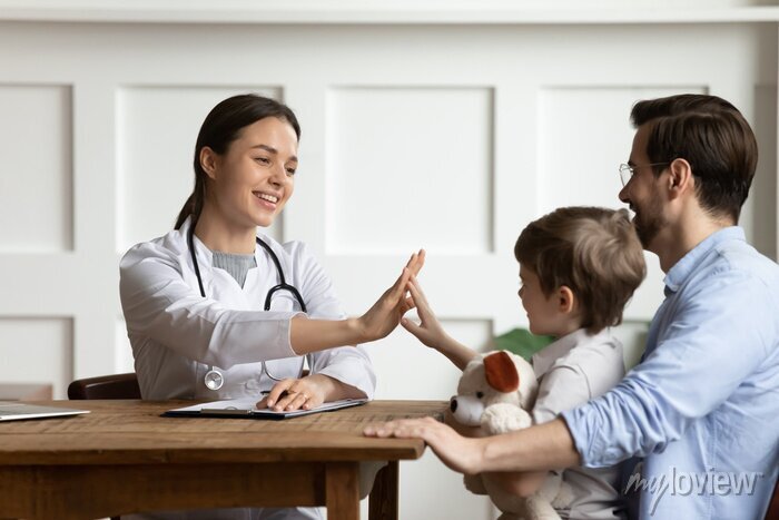 Close-up of a doctor holding a patient's hands, symbolizing trust and empathy in healthcare.